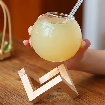 Elegant Moon Ball beverage tumbler, a unique glass drinkware piece for your home bar or kitchen decor.