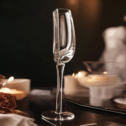 Modern sculptural stemmed wine glass, uniquely half-cut. Ideal for barware, drinkware, or a stylish home decor gift.