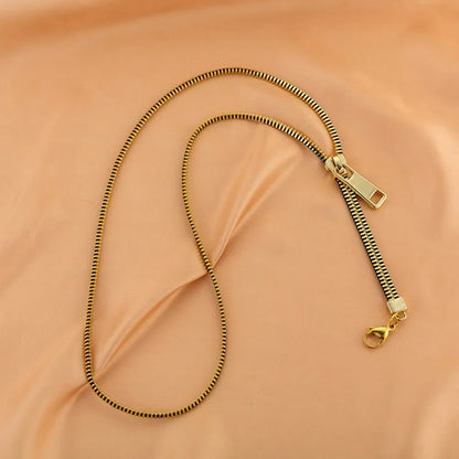 Elegant silver zipper necklace for women, versatile fashion jewelry accessory with a unique design.
