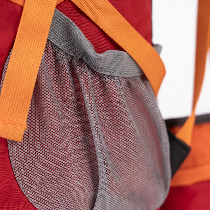 Water-resistant 11gal hiking daypack. Essential outdoor gear for camping, trails, and active travel. Unisex design.