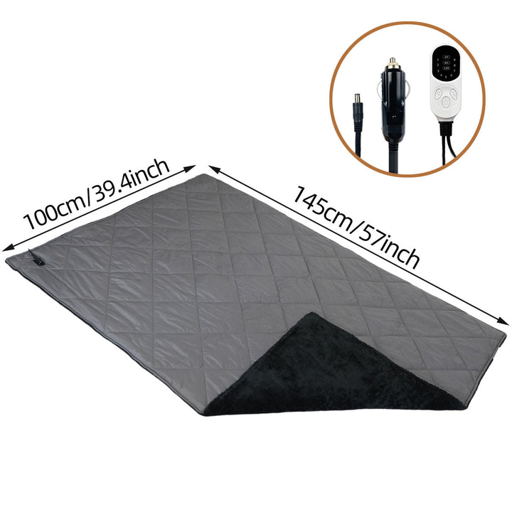 Unisex heating blanket keeping car passenger warm during a snowy road trip, ultimate cozy comfort