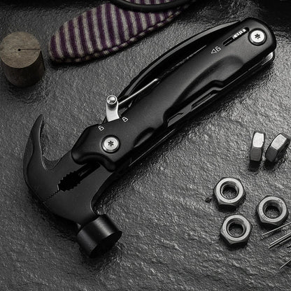 Close-up of portable 13-in-1 hammer multitool, essential survival camping tool