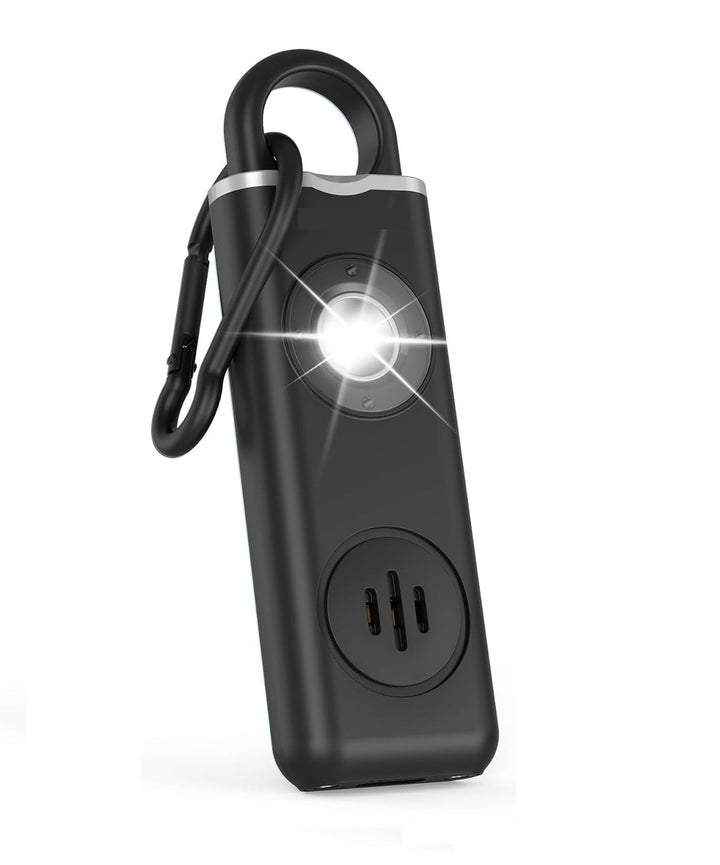 Compact and powerful 130dB self-defense alarm keychain, easily attachable to bags or keys.