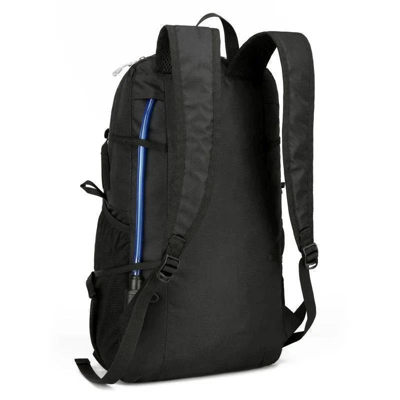 Compact 18L foldable backpack in blue, ideal as an adventure travel daypack