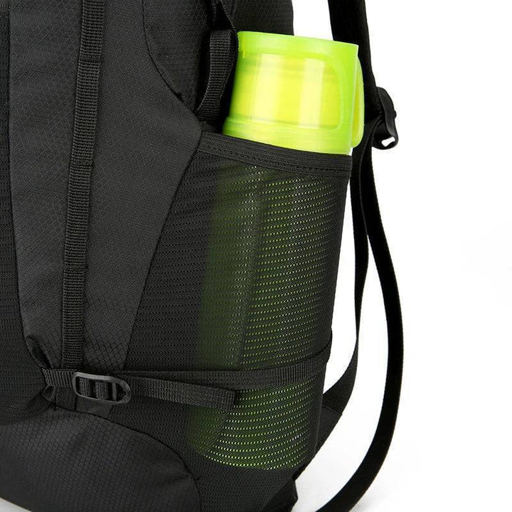 Water-resistant 18L hiking backpack in green for men and women, suitable for outdoor adventures