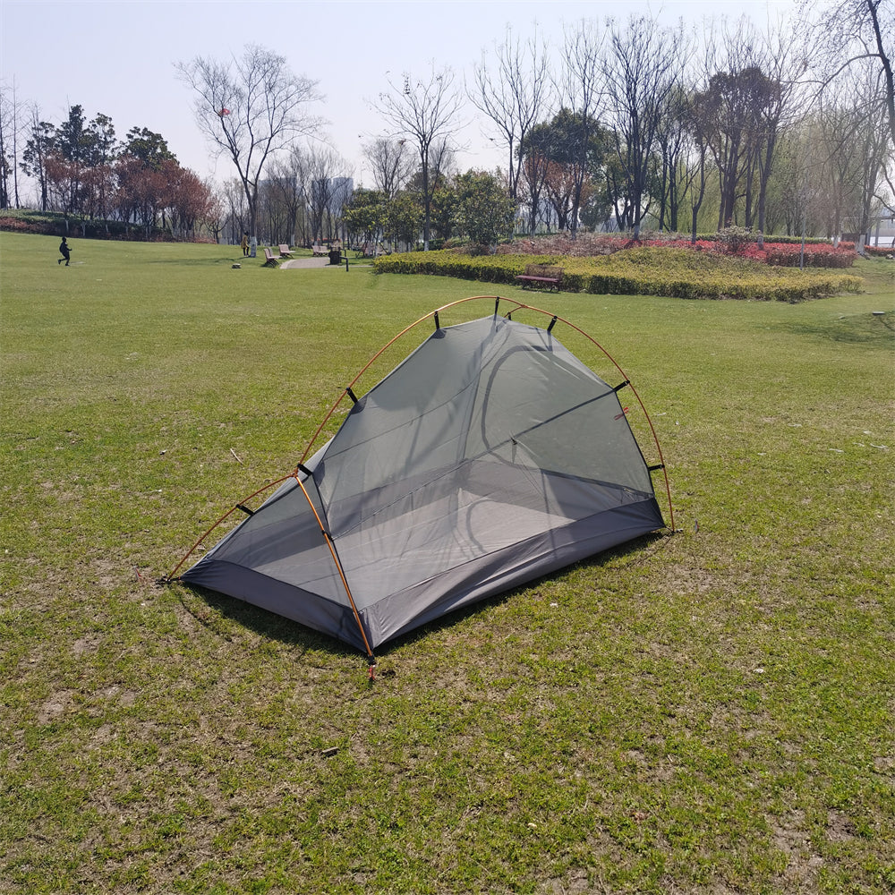 Interior view of a spacious 2-3 person multi-season camping tent, showing ample room.