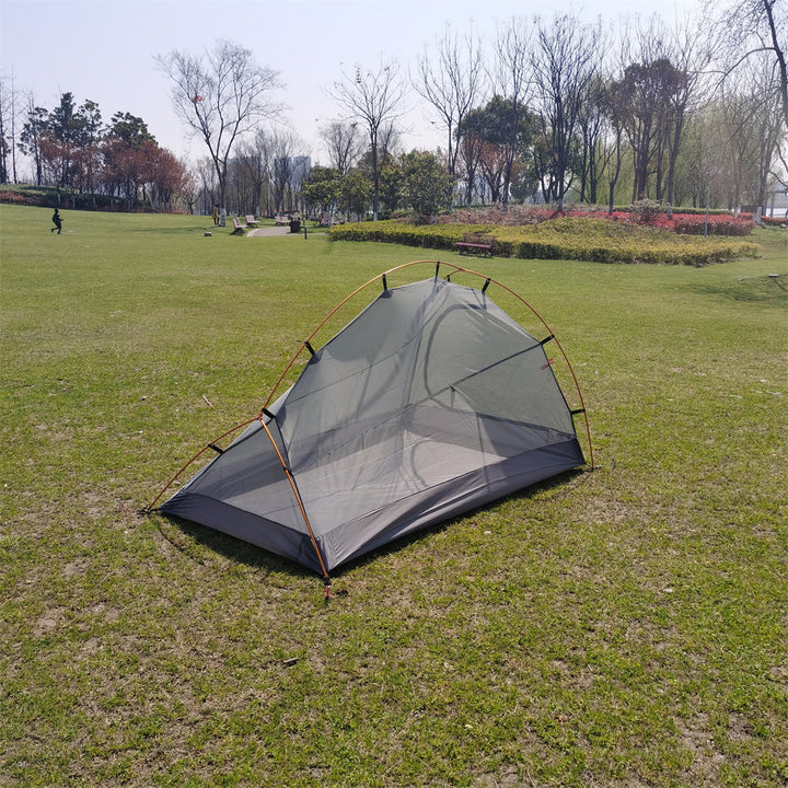Interior view of a spacious 2-3 person multi-season camping tent, showing ample room.