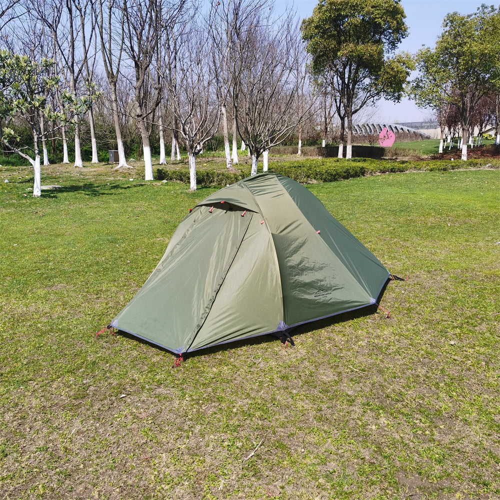 Unisex all-season camping tent in a snow-covered landscape, highlighting its durability.