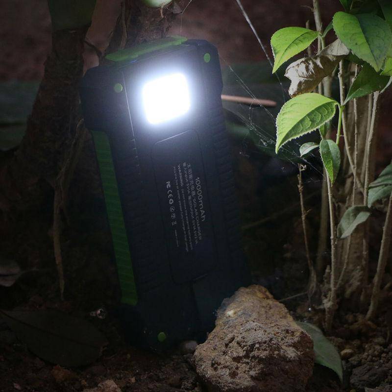 Waterproof 20000mAh solar portable charger for outdoor gear, featuring an emergency light.