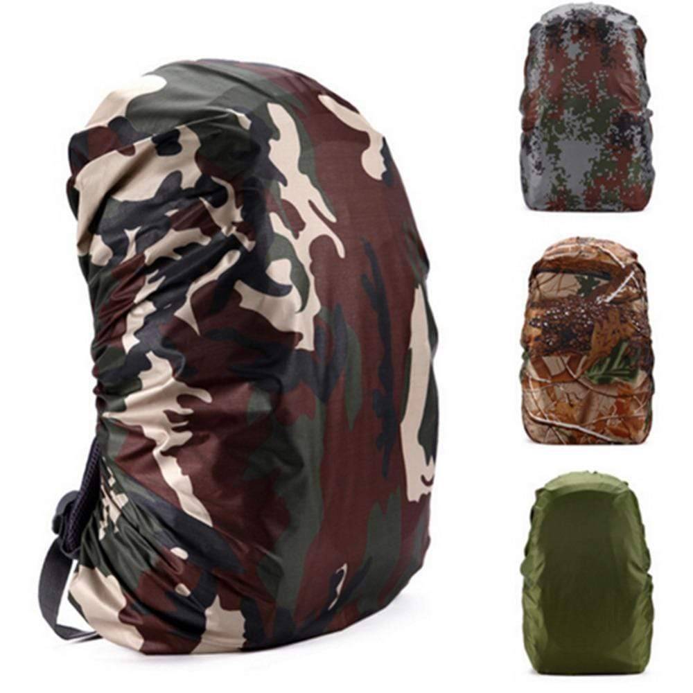 Unisex 210D waterproof backpack rain cover, black, protecting a hiking backpack in an outdoor setting