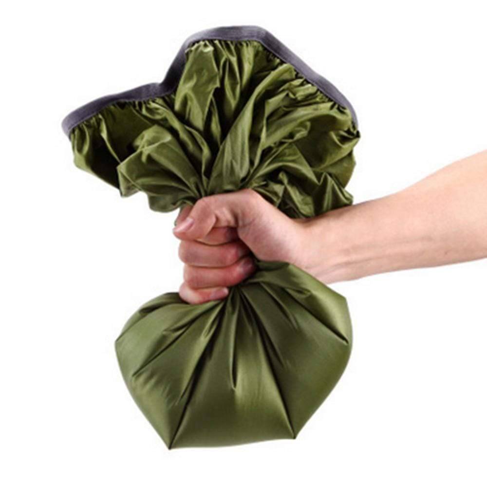 Outdoor gear: a blue 210D waterproof backpack cover folded compactly, ready for travel or camping