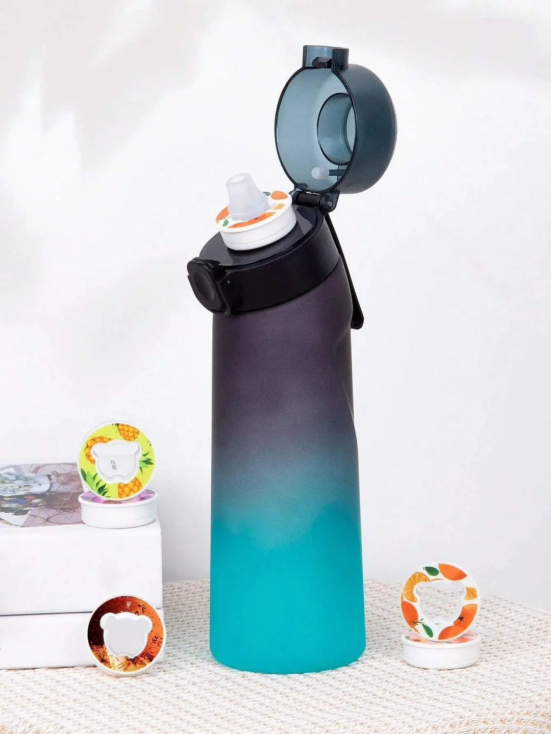 Reusable scent water bottle, 0.65L. Enjoy flavored water with aroma pods for wellness.