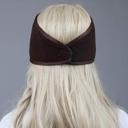 Unisex model wearing a black fleece ear warmer headband, ready for outdoor winter activities.