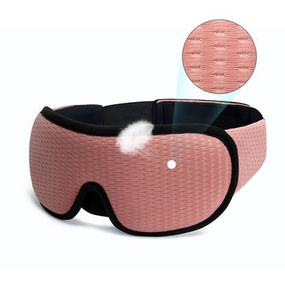 Unisex eye mask with contoured design, ideal for travel, ensuring comfortable & restful blackout sleep.