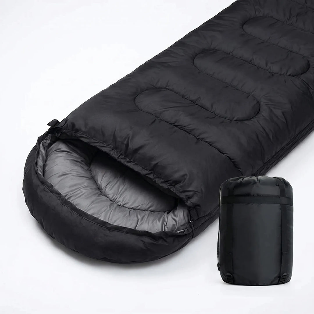 Compact & portable unisex 4-season mummy envelope sleeping bag, perfect for comfortable cold weather camping.