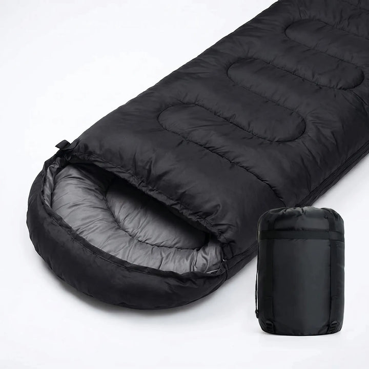 Compact & portable unisex 4-season mummy envelope sleeping bag, perfect for comfortable cold weather camping.