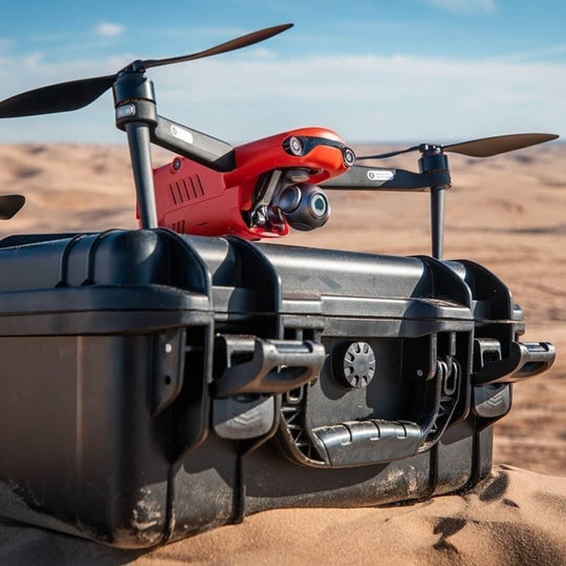 Unisex 4K UHD camera drone with extended flight time for aerial photography & video capture.