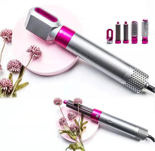 Multi-styler with interchangeable heads: hot air brush, curling iron, volumizer, and hair dryer.