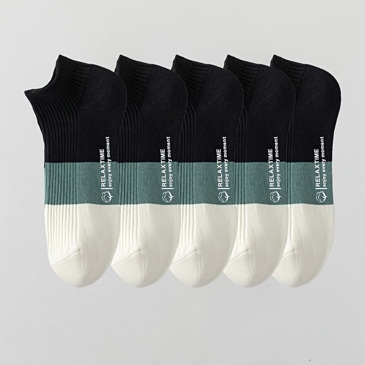 Versatile unisex ankle socks, 5-pack. Soft cotton blend offers breathable, moisture-wicking comfort for everyday.