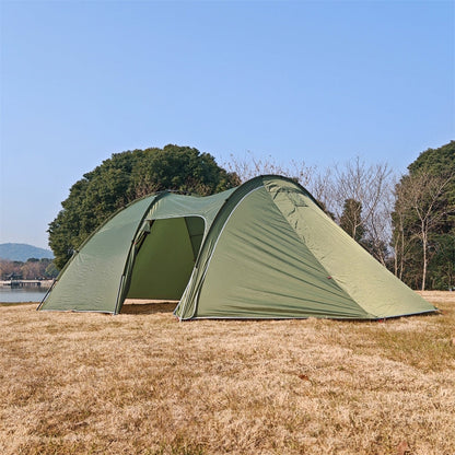 Family enjoying the outdoor shelter of a 6-person tunnel tent with its large, comfortable awning.