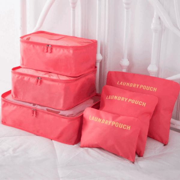 Two complete sets of space-saving luggage packing organizers. Unisex travel gear.