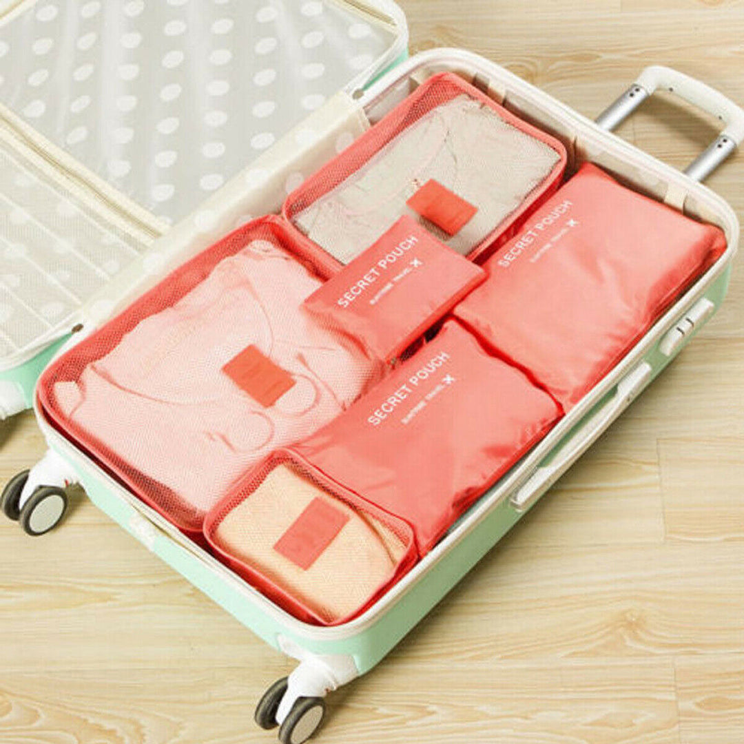 Unisex travel accessories: Waterproof luggage organizer set. Perfect for vacation packing.