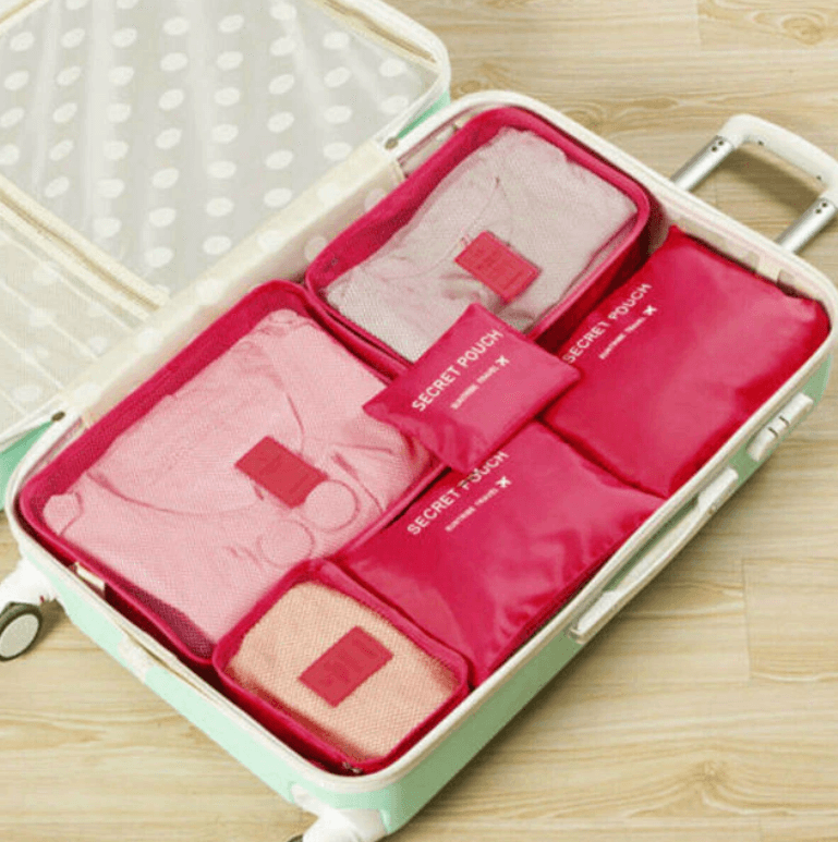 Keep your suitcase neat with this 6-piece space-saving travel bag set. Efficient packing cubes.