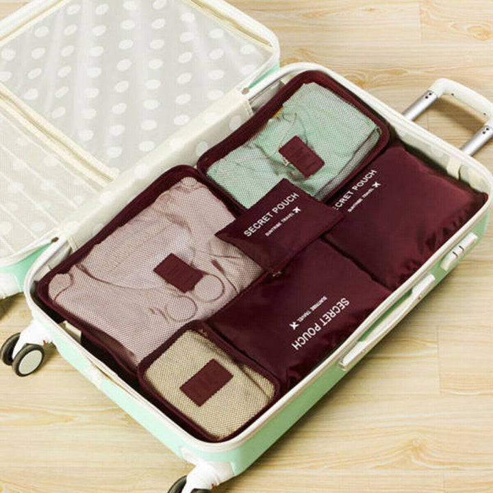 Travel smarter with a unisex 12-piece (2x6) packing organizer set. Waterproof for all trips.