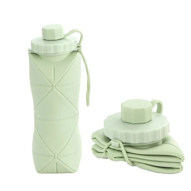 Collapsible silicone water bottle in a neutral color, 600ml, a versatile hydration solution for home and gym.