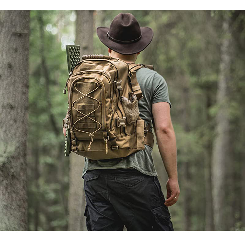 Close-up of the front pocket on a unisex 60L tactical backpack, showing molle webbing details