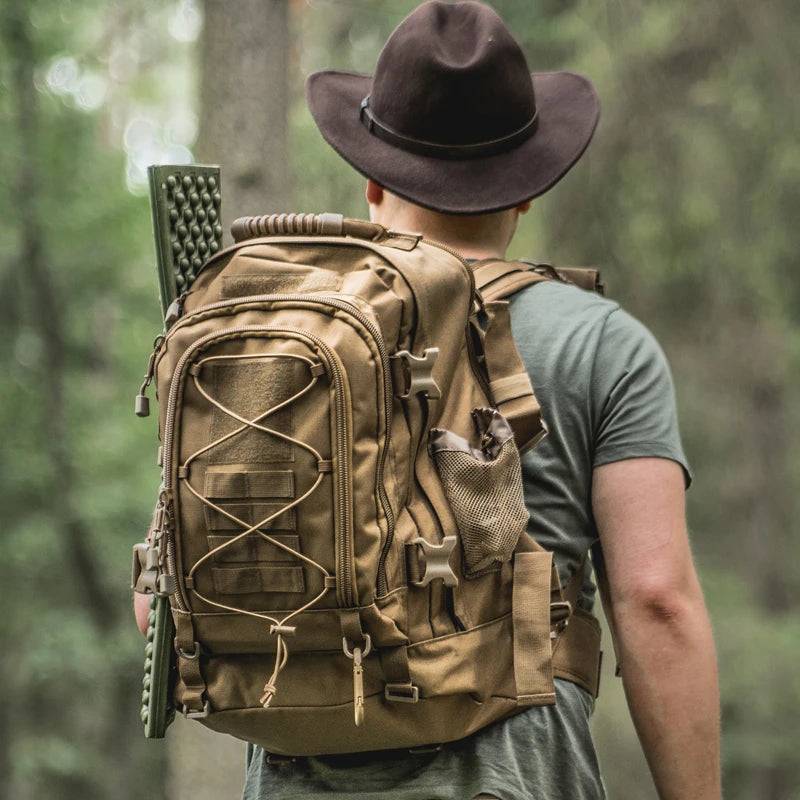 Waterproof 65L outdoor backpack, expandable design for camping supplies and tactical gear