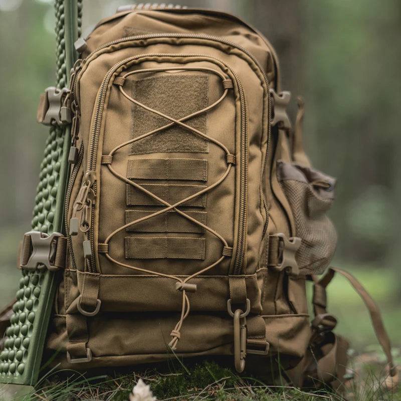 Side view of a 65L unisex tactical backpack with multiple compartments for organized travel