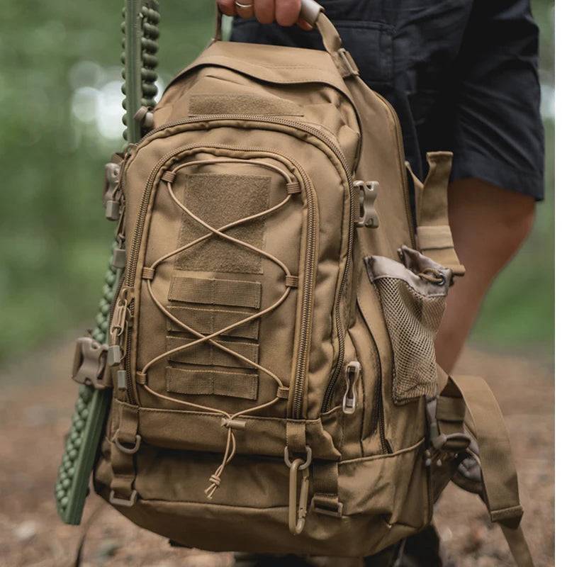 Front view of an expandable military rucksack in black, suitable for hiking and outdoor activities