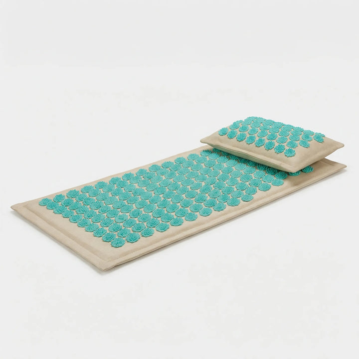 Acupressure massage mat & pillow for wellness. Ideal self-care tool for stress reduction & body care.
