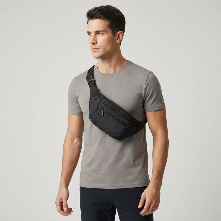 Travel-ready unisex sling bag with multiple compartments, designed for convenient organization of travel essentials.