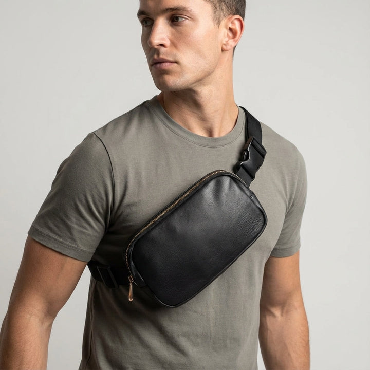 Versatile unisex sling bag: wear as a crossbody, waist pack, or chest bag. Adjustable strap & waterproof for travel/sport.