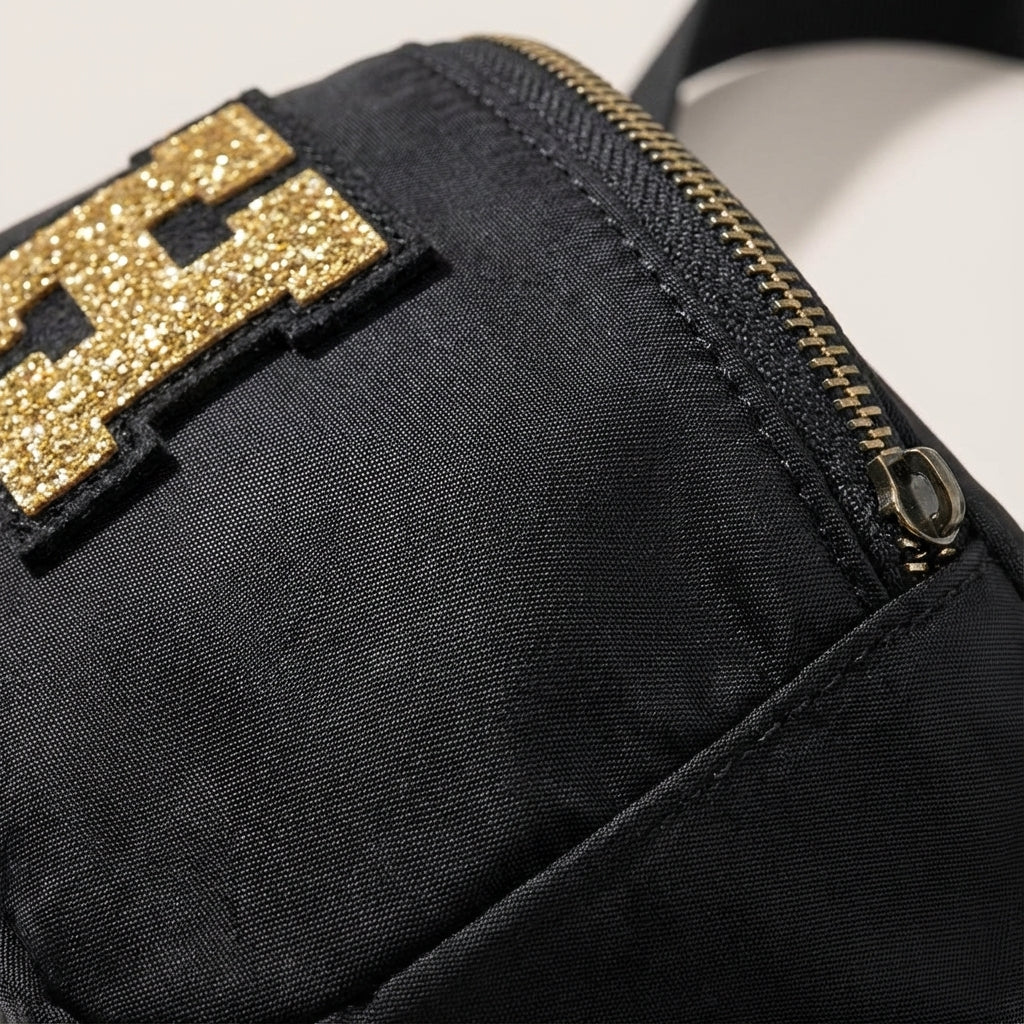 Durable waterproof nylon crossbody sling bag with adjustable strap. Ideal for daily essentials, travel, or sport. Unisex design.