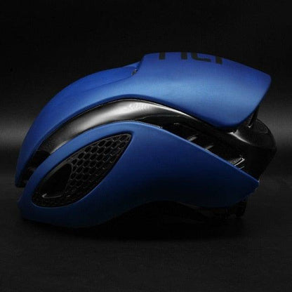 Red aerodynamic cycling helmet, designed to reduce drag and improve performance for competitive cyclists