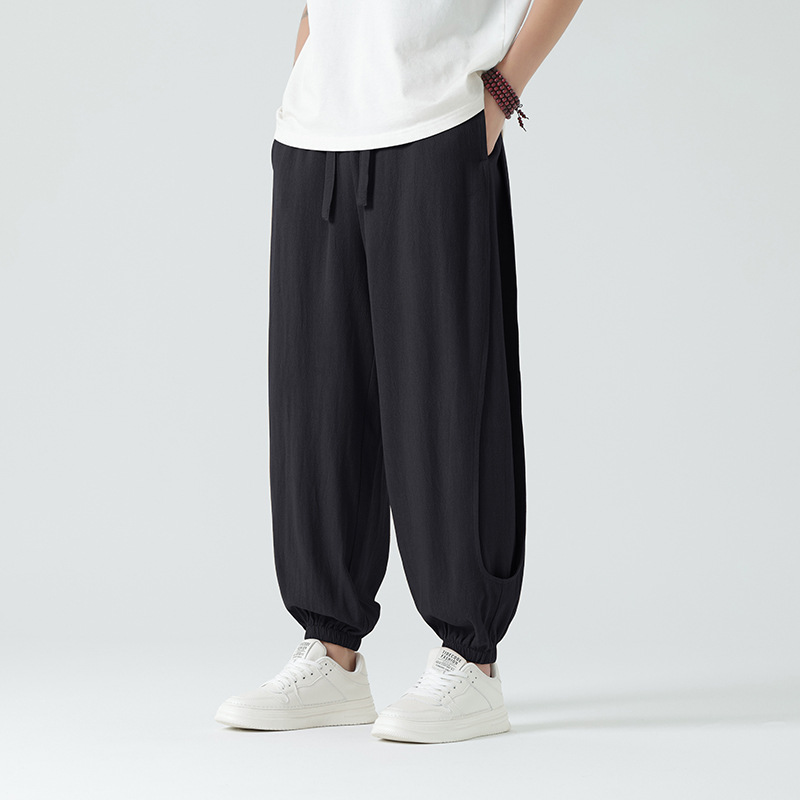 Versatile Airdrifter unisex joggers: relaxed fit, breathable, comfortable for lounging, casual, or athletic use.