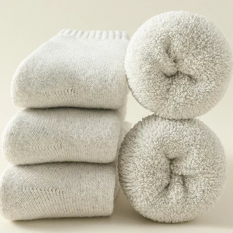 Person wearing warm, comfortable unisex Alpine cozy socks; ideal winter footwear for everyday comfort.