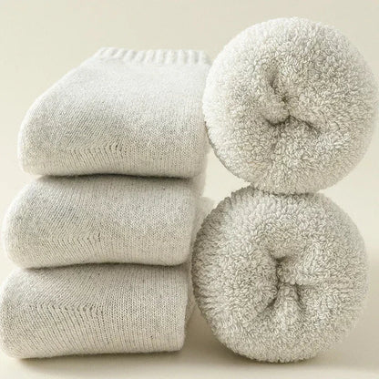 Person wearing warm, comfortable unisex Alpine cozy socks; ideal winter footwear for everyday comfort.