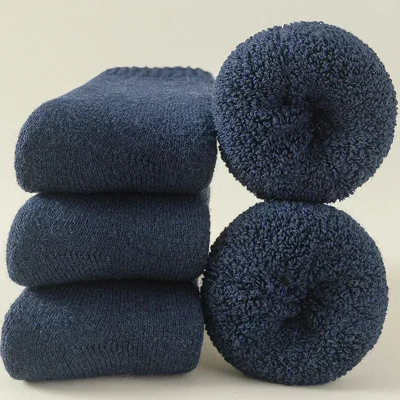 Assortment of unisex Alpine cozy socks 3-pack, featuring various colors for warm, comfortable winter wear.