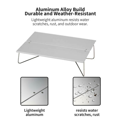 Outdoor shot of the foldable aluminum table, demonstrating its stability for camping and outdoor use.