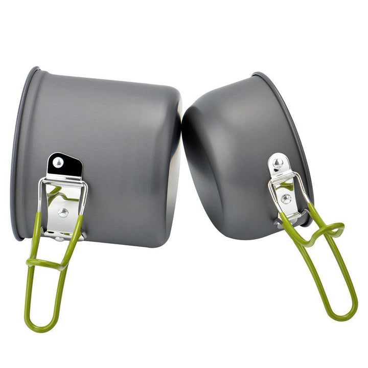 Portable camping cookware set with pots, pans, & utensils for outdoor cooking and travel gear.