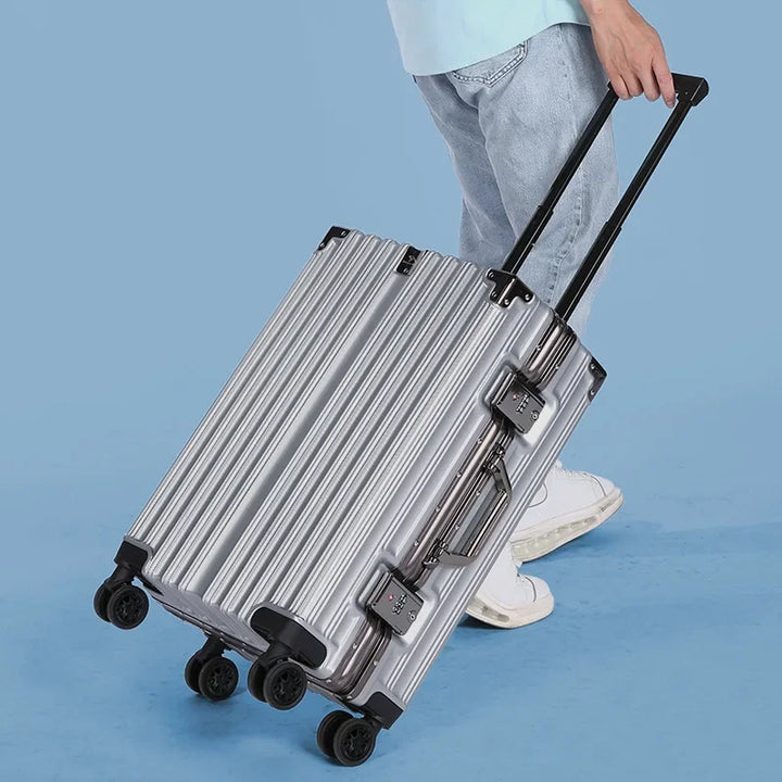 Durable checked bag: Unisex aluminum frame hard-shell luggage with security lock for safe travel.