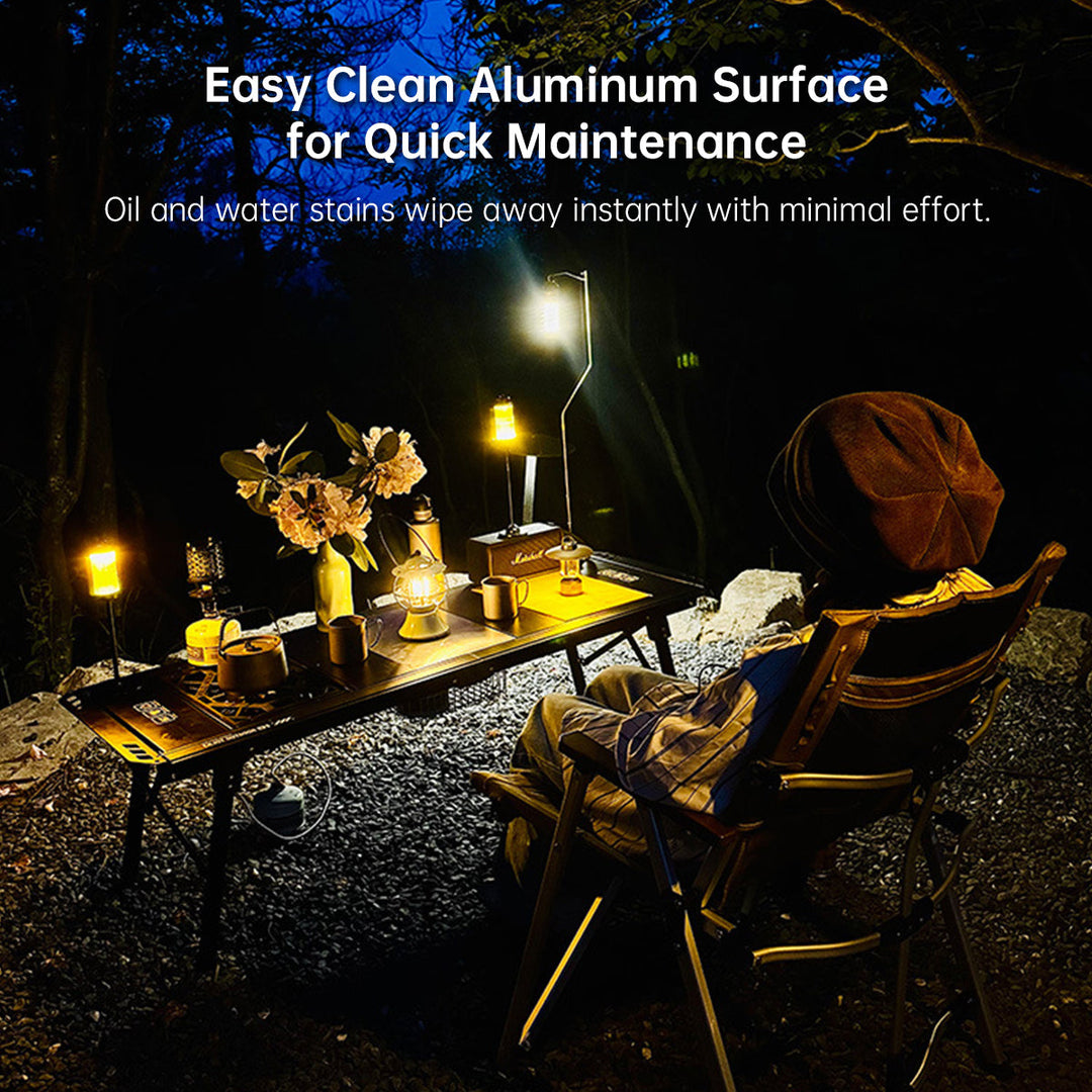 Folding aluminum camping table with stable design, great for picnics and outdoor events