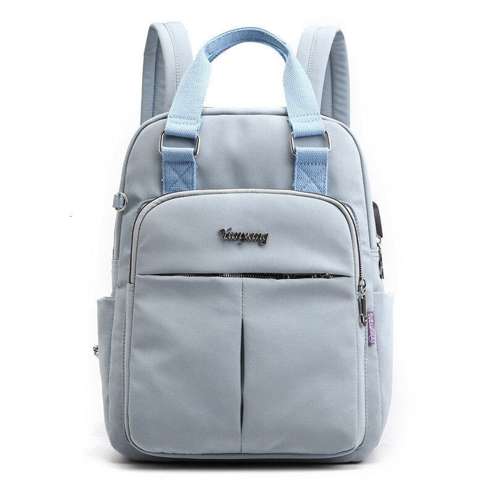 Durable water-resistant anti-theft backpack, perfect for protecting your laptop & essentials on the go.