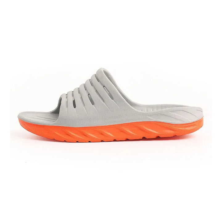 Orthotic arch support slides for plantar fasciitis and general foot pain. Ideal cushioning house shoes for recovery.