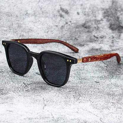 Close-up of Arden unisex sunglasses, showcasing elegant wood-grain temples and dark lenses. Ideal for any outdoor activity.