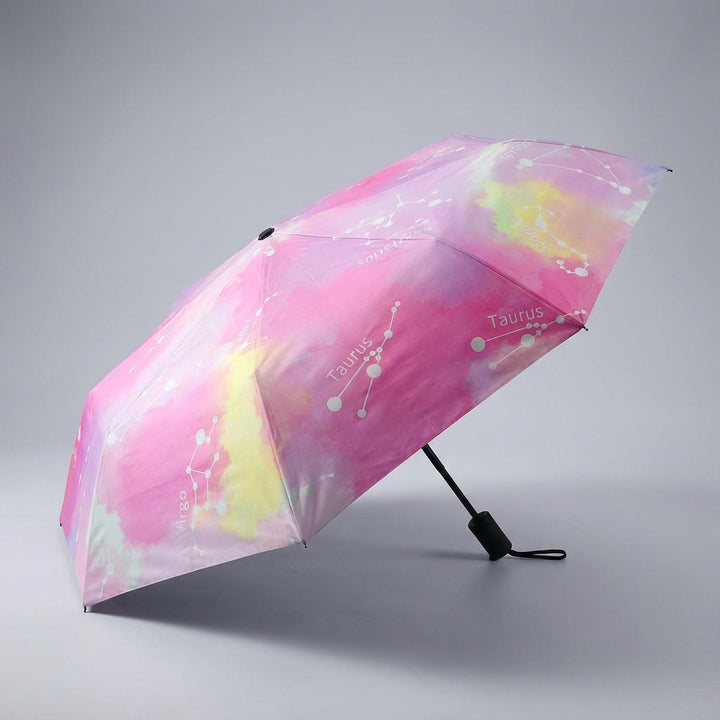 Unisex windproof travel umbrella by Rainova, designed for automatic, compact folding and easy storage.